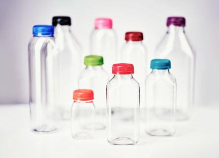 clear-plastci-bottles-with-colored-caps-beauty-shot 2